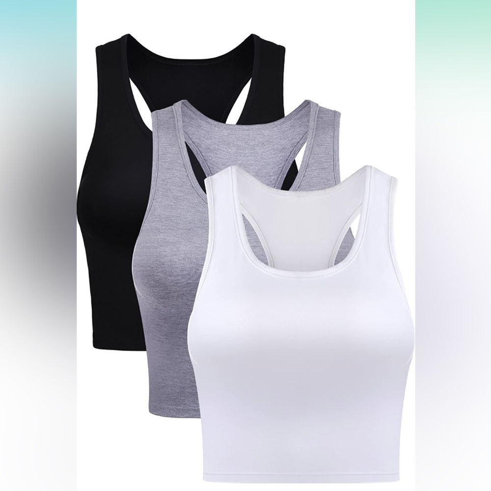 White, grey and black tank crop tops .